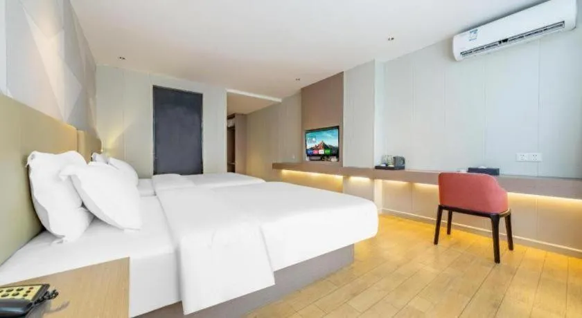 Bed in Borrman Hotel Shaoguan Century East Street Fengcai Building