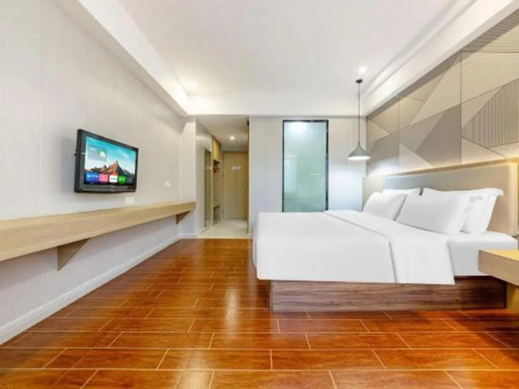 Bed in Borrman Hotel Shaoguan Century East Street Fengcai Building