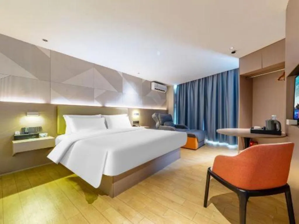 Bed in Borrman Hotel Shaoguan Century East Street Fengcai Building