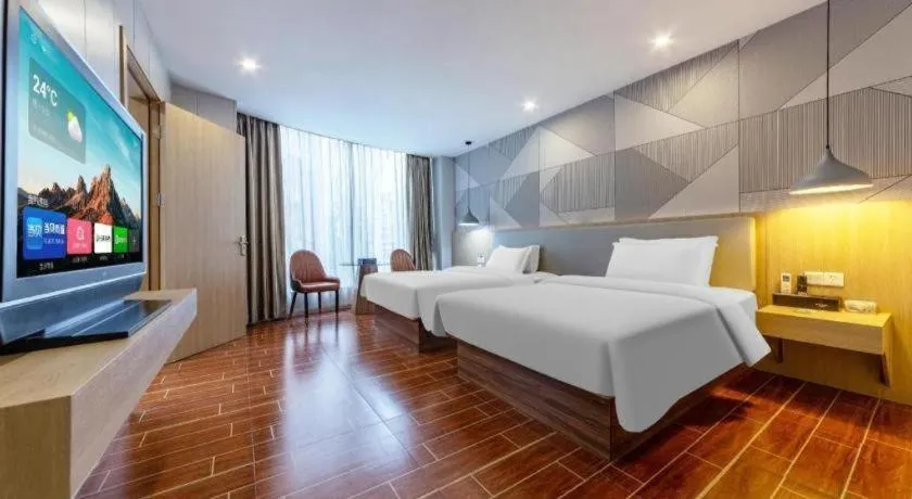 Bed in Borrman Hotel Shaoguan Century East Street Fengcai Building