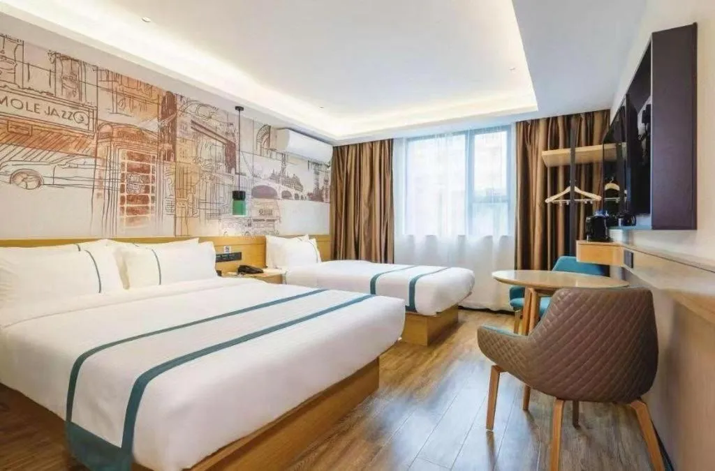 Bed in City Comfort Inn Zhuhai Doumen Daxin Xinduhui Pedestrian Street