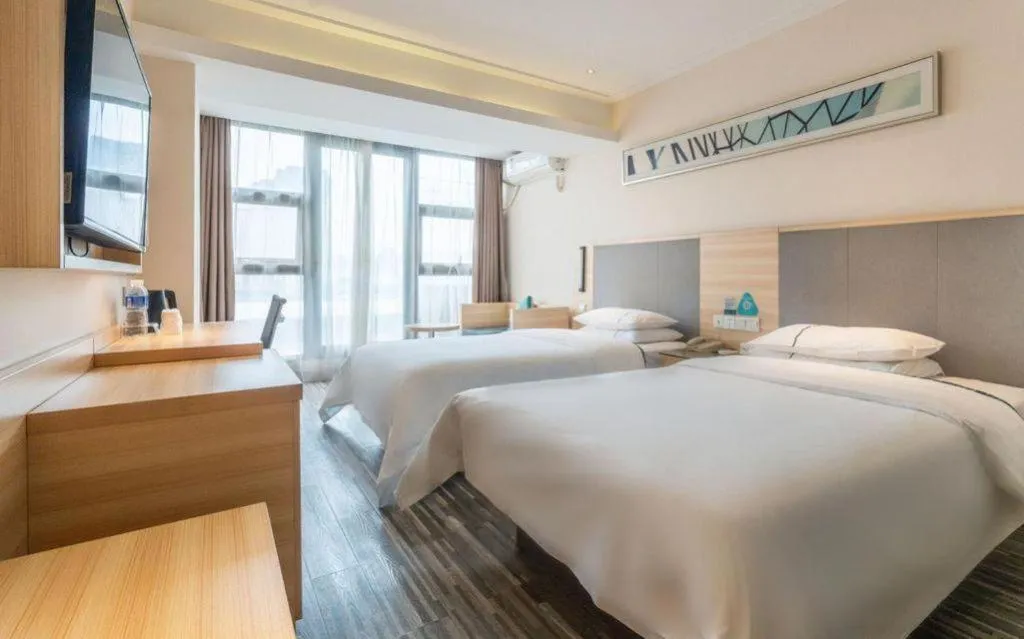 Bed in City Comfort Inn Chengdu Giant Panda Base