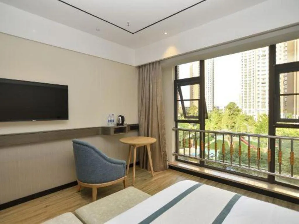 Bed in City Comfort Inn Kunming Xinluojiu Bay Guangju Road