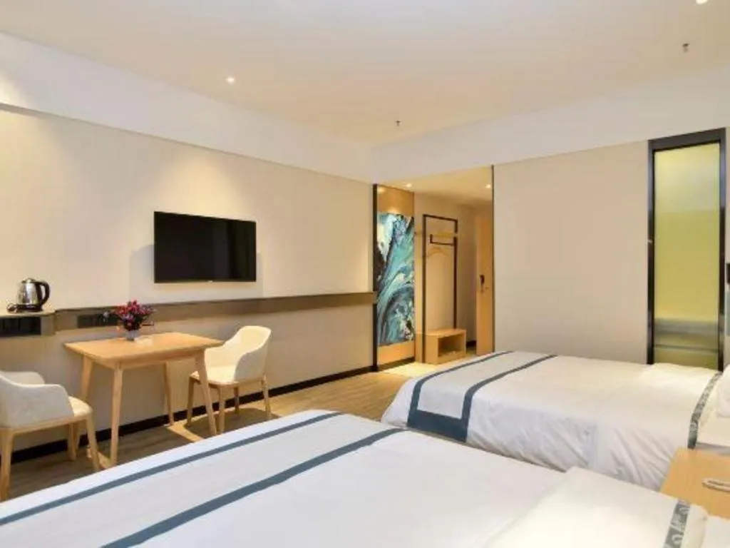 Bed in City Comfort Inn Kunming Xinluojiu Bay Guangju Road