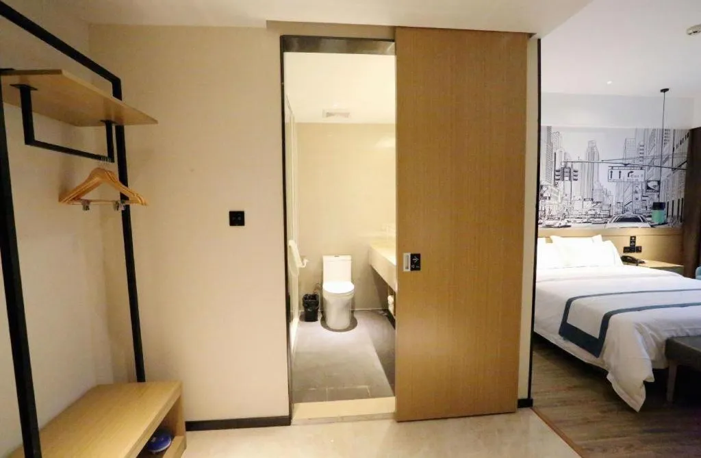 Bed in City Comfort Inn Shaoguan High-speed Railway Station Guanshaoyuan