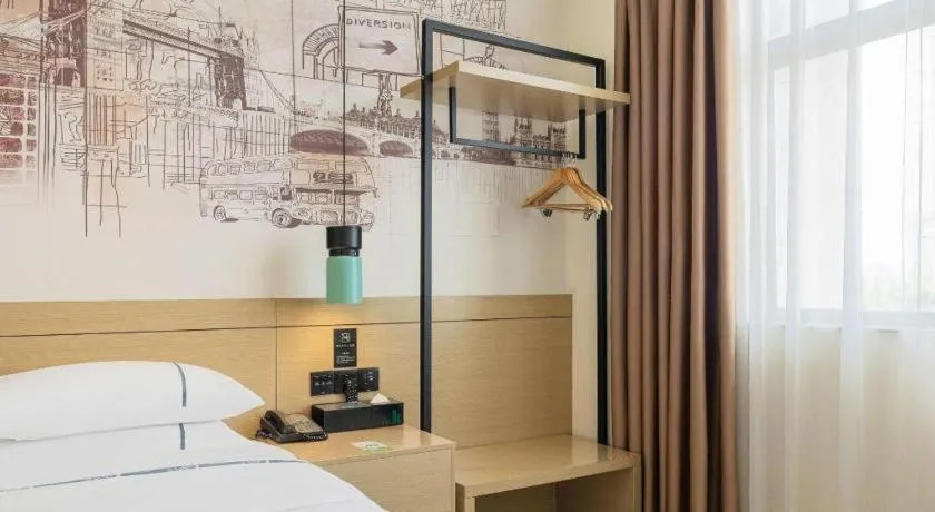 Bed in City Comfort Inn Shaoguan High-speed Railway Station Guanshaoyuan