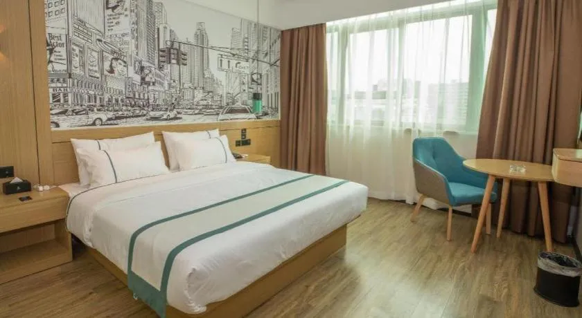 Bed in City Comfort Inn Shaoguan High-speed Railway Station Guanshaoyuan