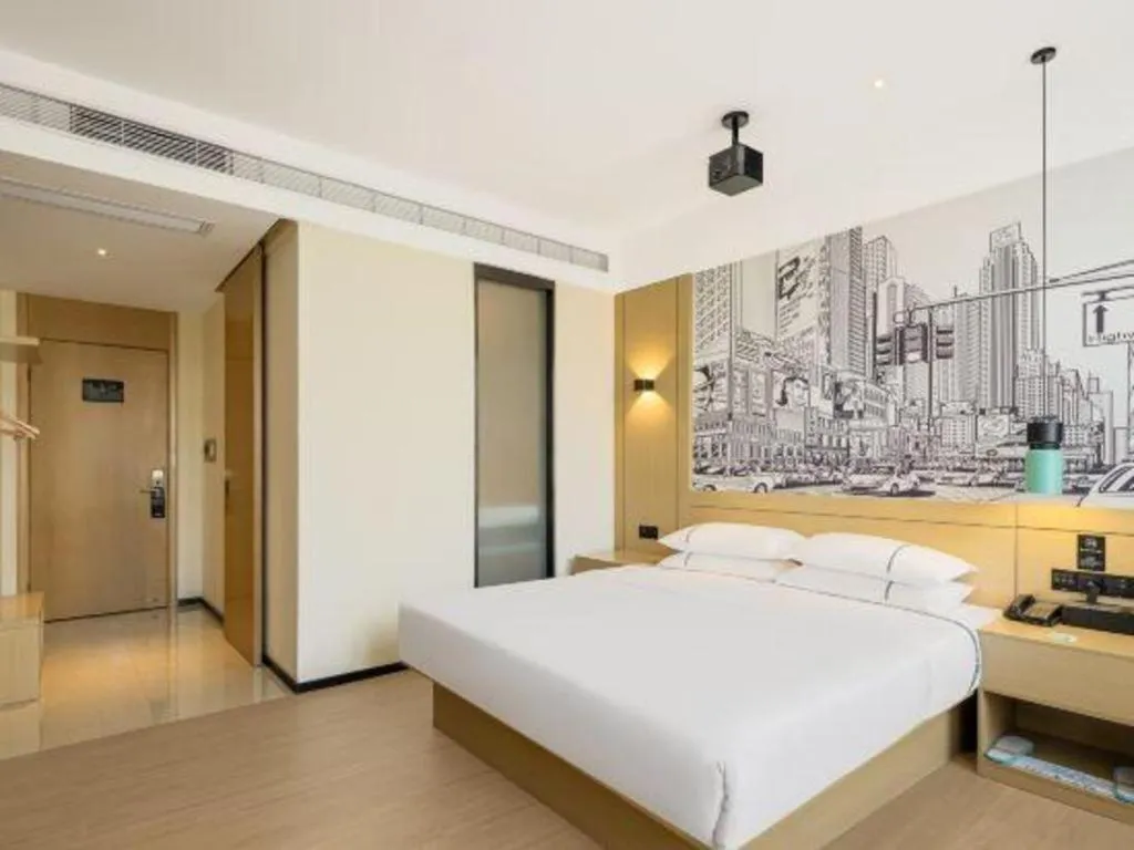 Bed in City Comfort Inn Shaoguan High-speed Railway Station Guanshaoyuan