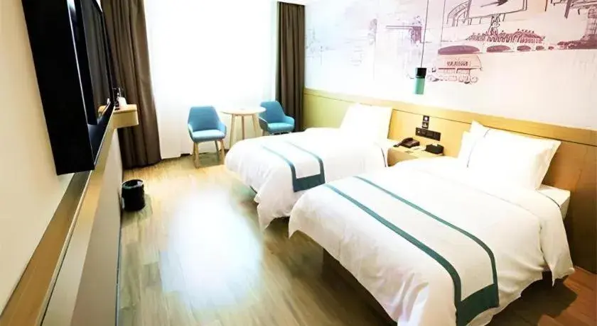 Bed in City Comfort Inn Shaoguan High-speed Railway Station Guanshaoyuan Bed in City Comfort Inn Shaoguan High-speed Railway Station Guanshaoyuan