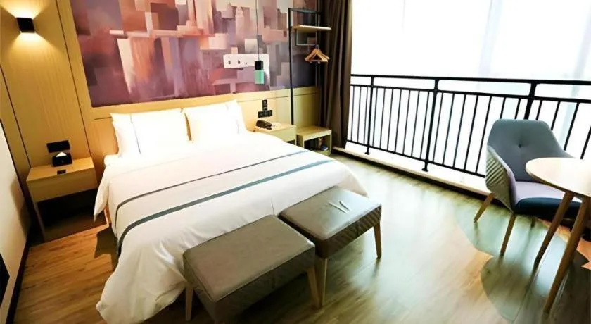 Bed in City Comfort Inn Shaoguan High-speed Railway Station Guanshaoyuan
