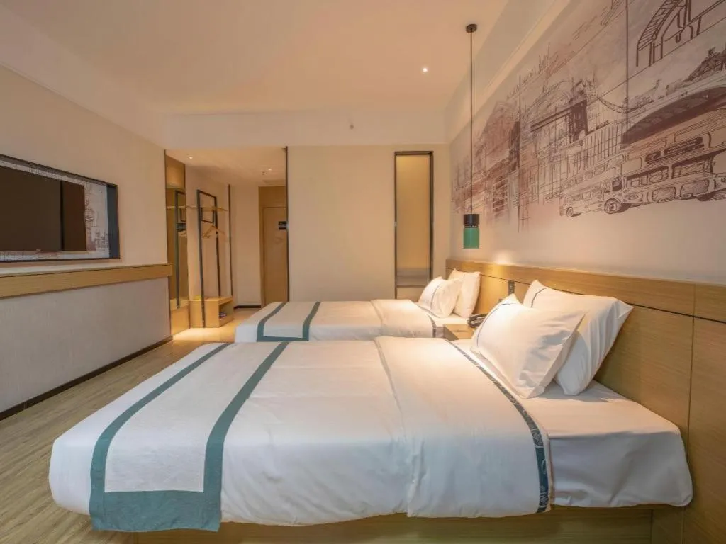 Bed in City Comfort Inn Shaoguan High-speed Railway Station Guanshaoyuan
