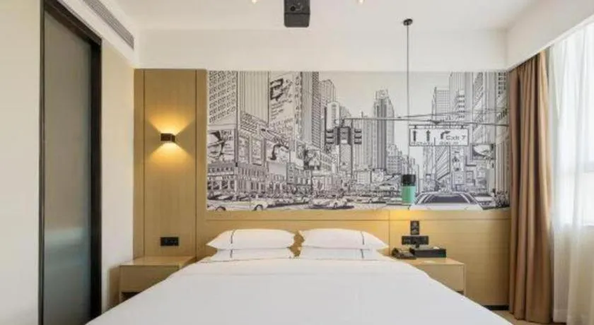 Bed in City Comfort Inn Shaoguan High-speed Railway Station Guanshaoyuan