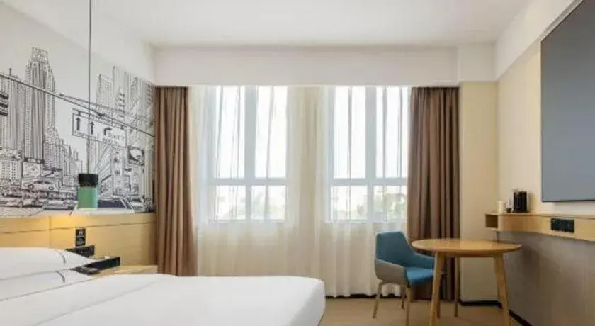 Bed in City Comfort Inn Shaoguan High-speed Railway Station Guanshaoyuan Bed in City Comfort Inn Shaoguan High-speed Railway Station Guanshaoyuan