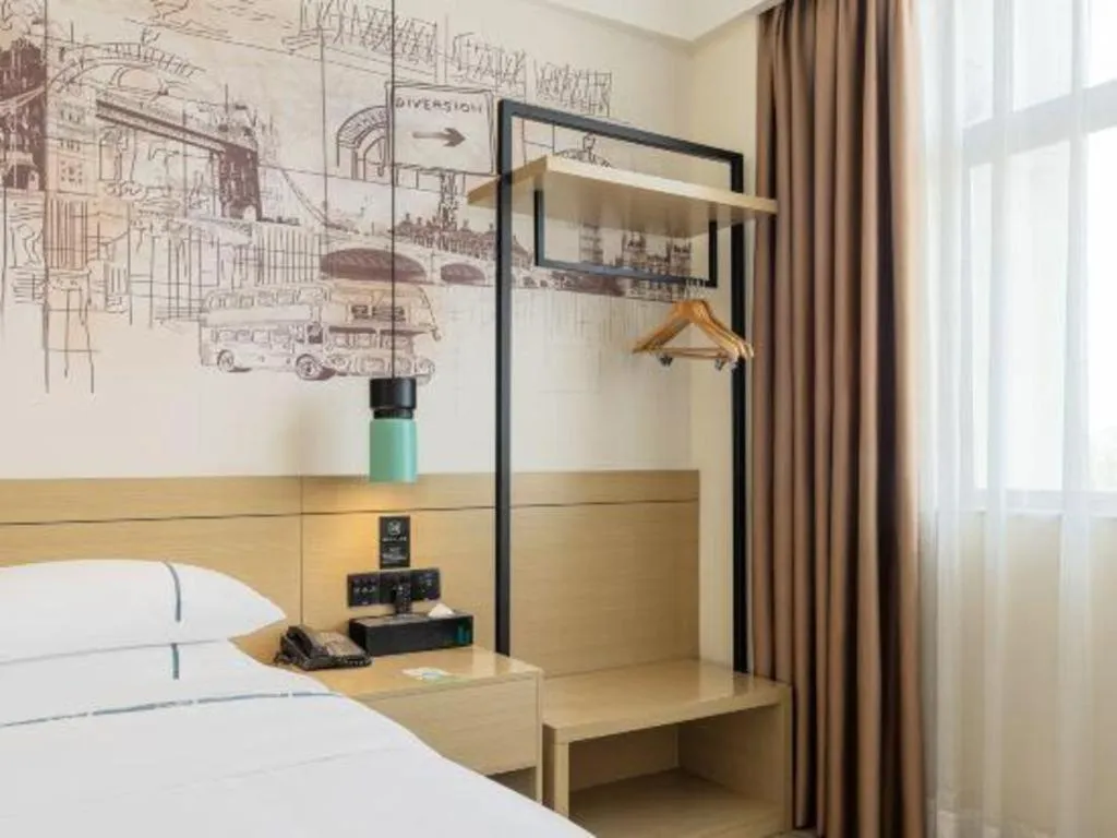 Bed in City Comfort Inn Shaoguan High-speed Railway Station Guanshaoyuan