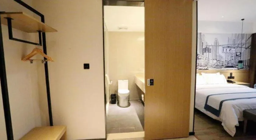 Bed in City Comfort Inn Shaoguan High-speed Railway Station Guanshaoyuan