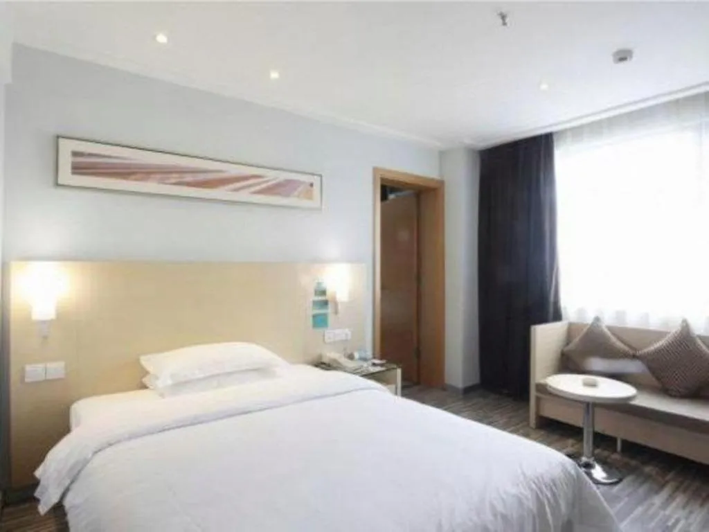 Bed in City Comfort Inn Shaoguan High-speed Railway Station Guanshaoyuan