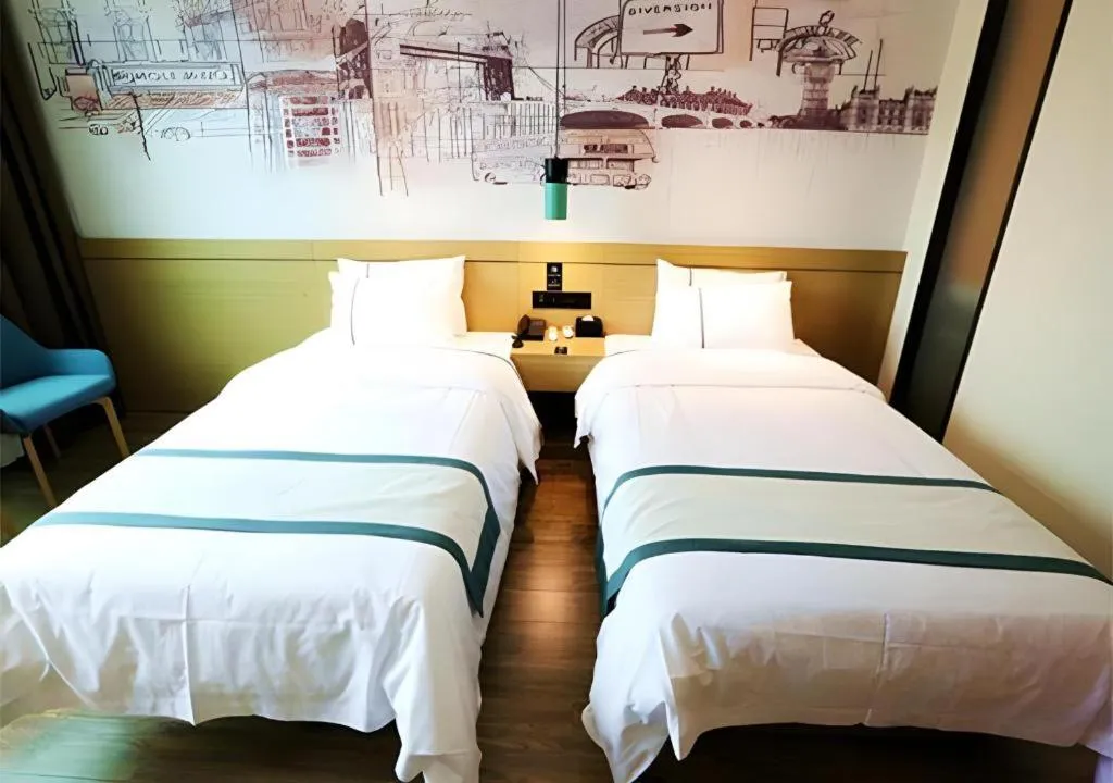 Bed in City Comfort Inn Shaoguan High-speed Railway Station Guanshaoyuan