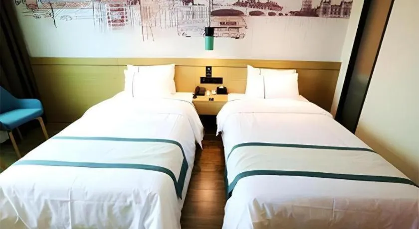 Bed in City Comfort Inn Shaoguan High-speed Railway Station Guanshaoyuan