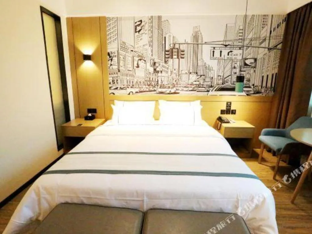 Bed in City Comfort Inn Shaoguan High-speed Railway Station Guanshaoyuan