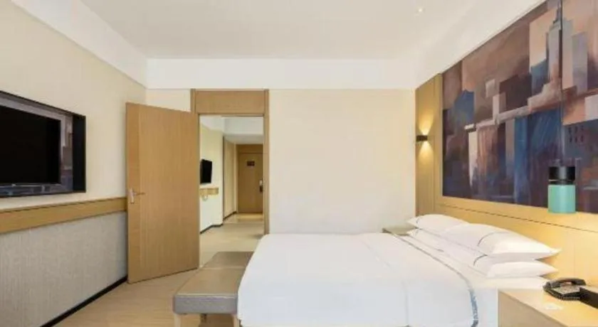 Bed in City Comfort Inn Shaoguan High-speed Railway Station Guanshaoyuan