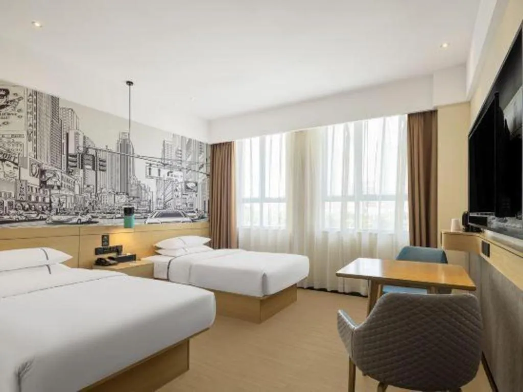 Bed in City Comfort Inn Shaoguan High-speed Railway Station Guanshaoyuan