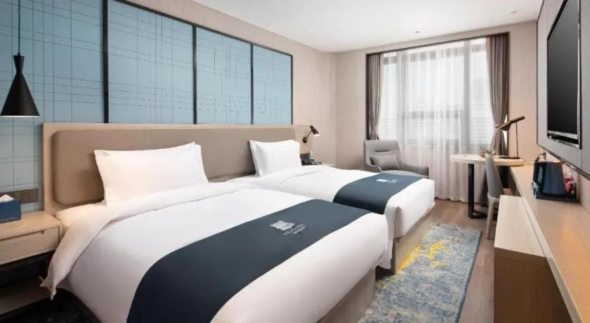 Bed in Echarm Hotel Shenyang Zhongjie North Station Metro Station