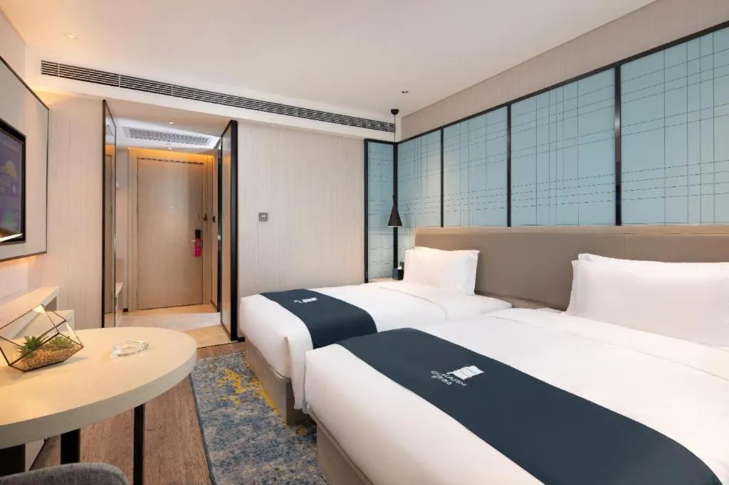 Bed in Echarm Hotel Shenyang Zhongjie North Station Metro Station