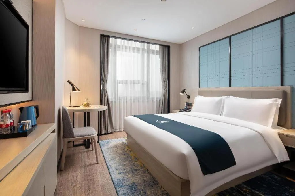 Bed in Echarm Hotel Shenyang Zhongjie North Station Metro Station