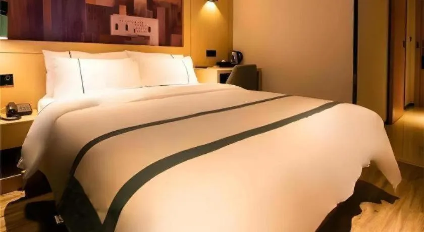 Bed in City Comfort Inn Changsha Outlets Datuo Metro Station