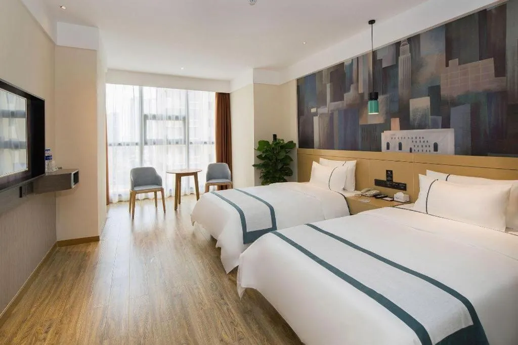 Bed in City Comfort Inn Changsha Outlets Datuo Metro Station