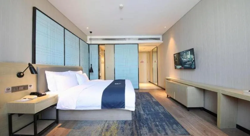 Bed in Echarm Hotel Guiyang North High-speed Railway Station