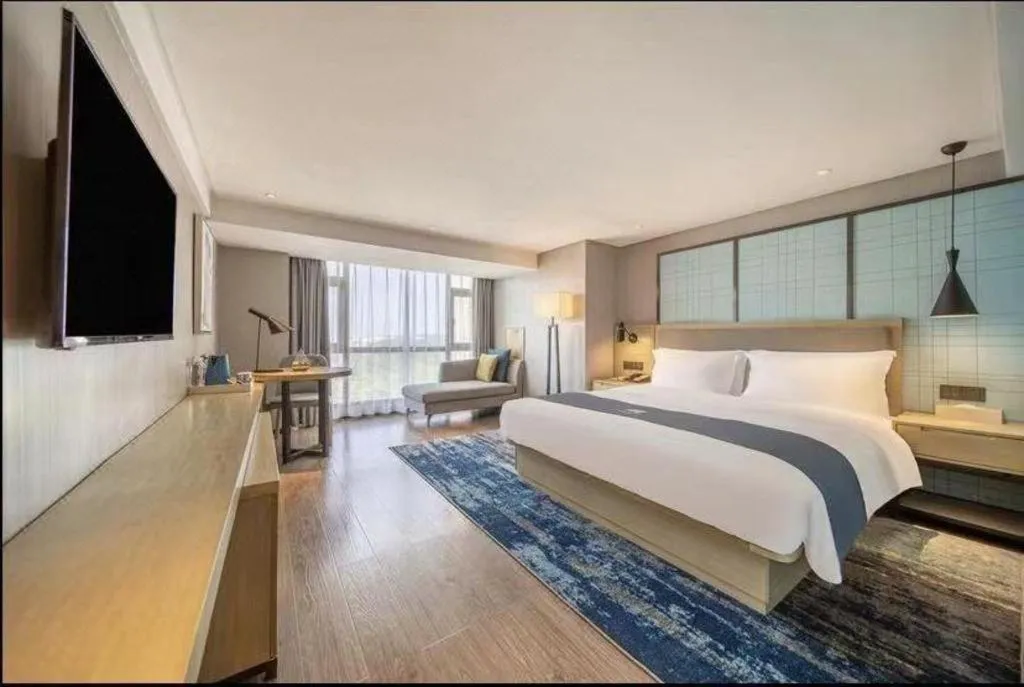 Bed in Echarm Hotel Guiyang North High-speed Railway Station