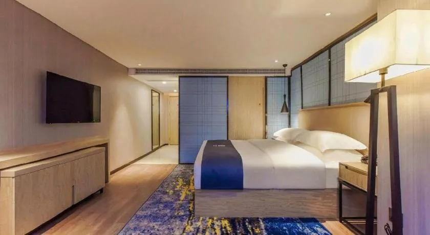 Bed in Echarm Hotel Guiyang North High-speed Railway Station