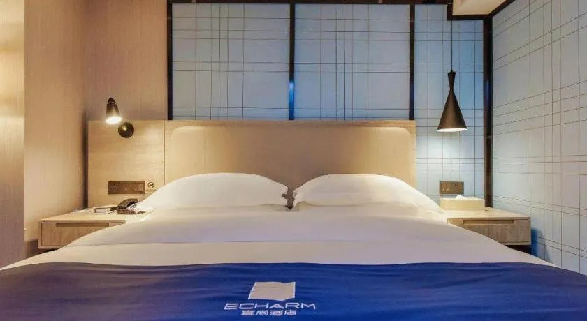 Bed in Echarm Hotel Guiyang North High-speed Railway Station