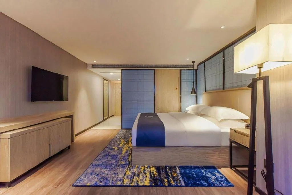 Bed in Echarm Hotel Guiyang North High-speed Railway Station