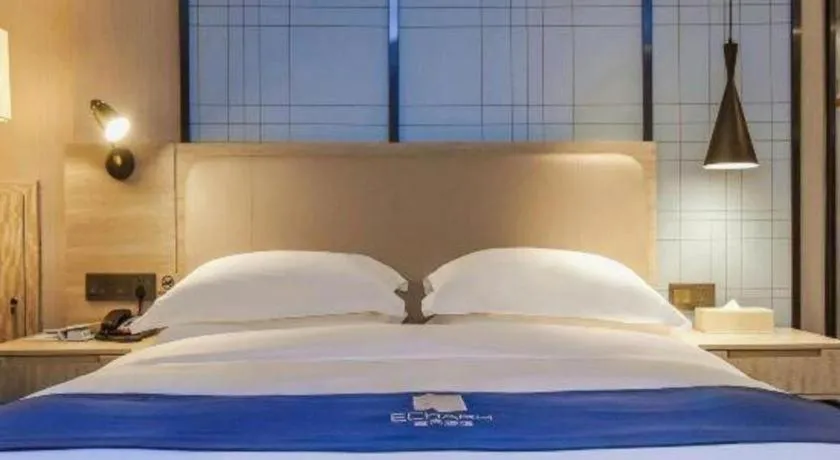 Bed in Echarm Hotel Guiyang North High-speed Railway Station
