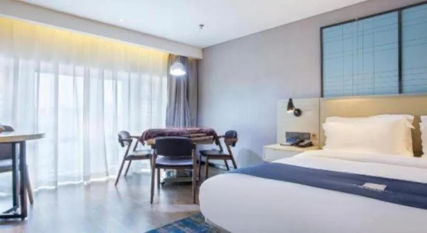 Bed in Echarm Hotel Guiyang North High-speed Railway Station