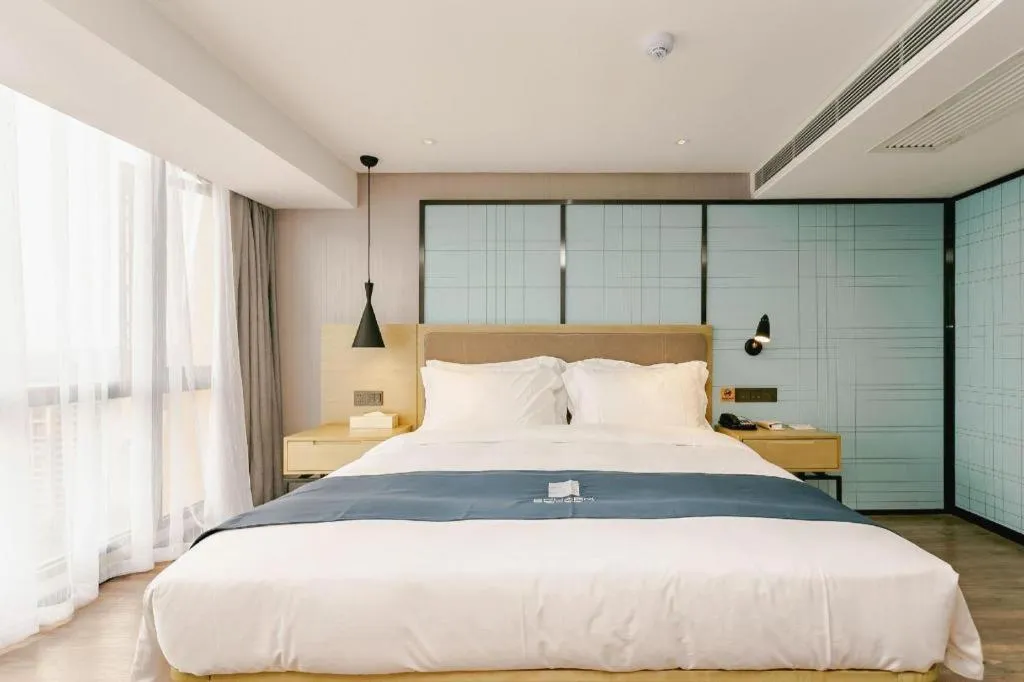 Bed in Echarm Hotel Guiyang North High-speed Railway Station