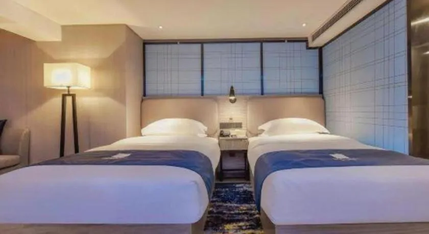 Bed in Echarm Hotel Guiyang North High-speed Railway Station