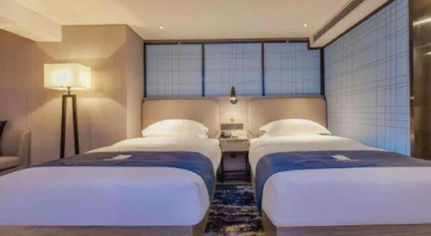 Bed in Echarm Hotel Guiyang North High-speed Railway Station