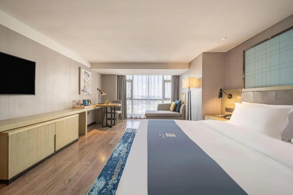 Bed in Echarm Hotel Guiyang North High-speed Railway Station