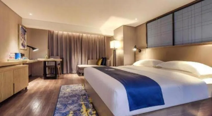 Bed in Echarm Hotel Guiyang North High-speed Railway Station