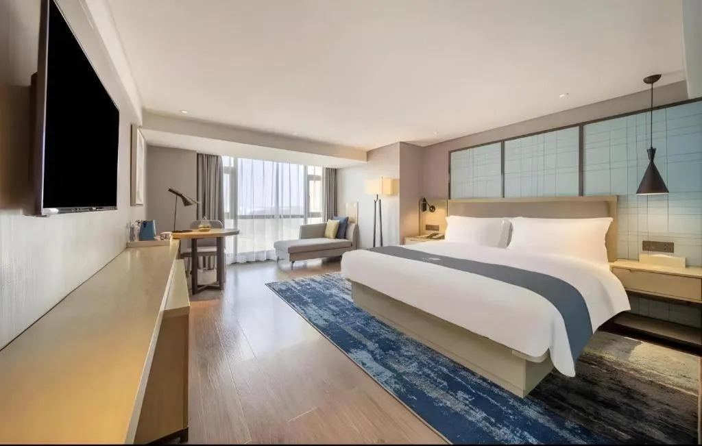 Bed in Echarm Hotel Guiyang North High-speed Railway Station