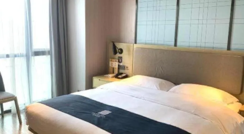 Bed in Echarm Hotel Guiyang North High-speed Railway Station
