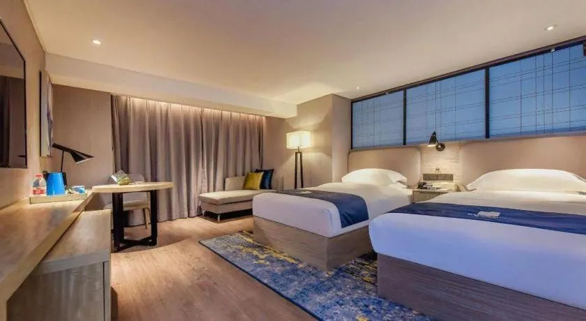 Bed in Echarm Hotel Guiyang North High-speed Railway Station