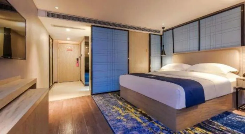 Bed in Echarm Hotel Guiyang North High-speed Railway Station