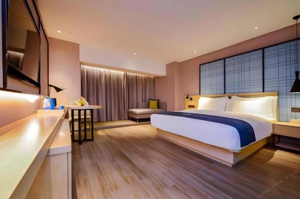Bed in Echarm Hotel Guiyang North High-speed Railway Station