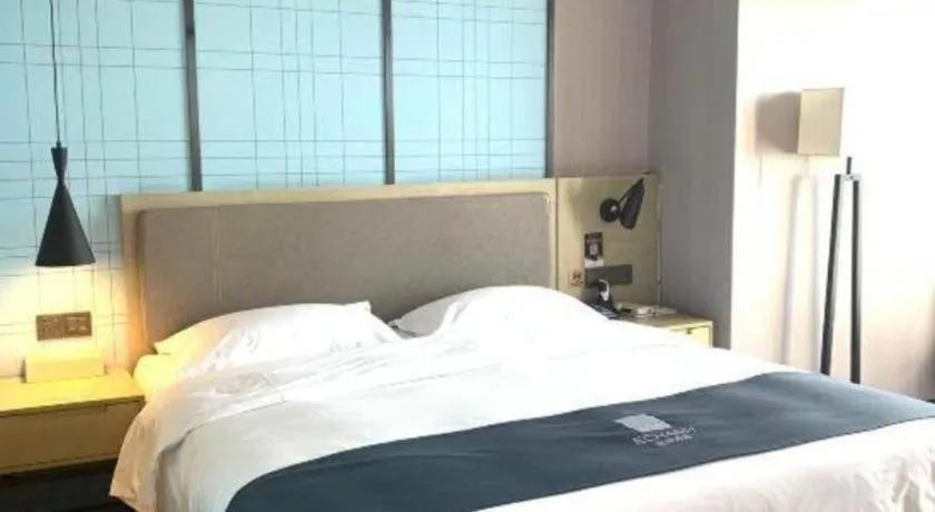Bed in Echarm Hotel Guiyang North High-speed Railway Station
