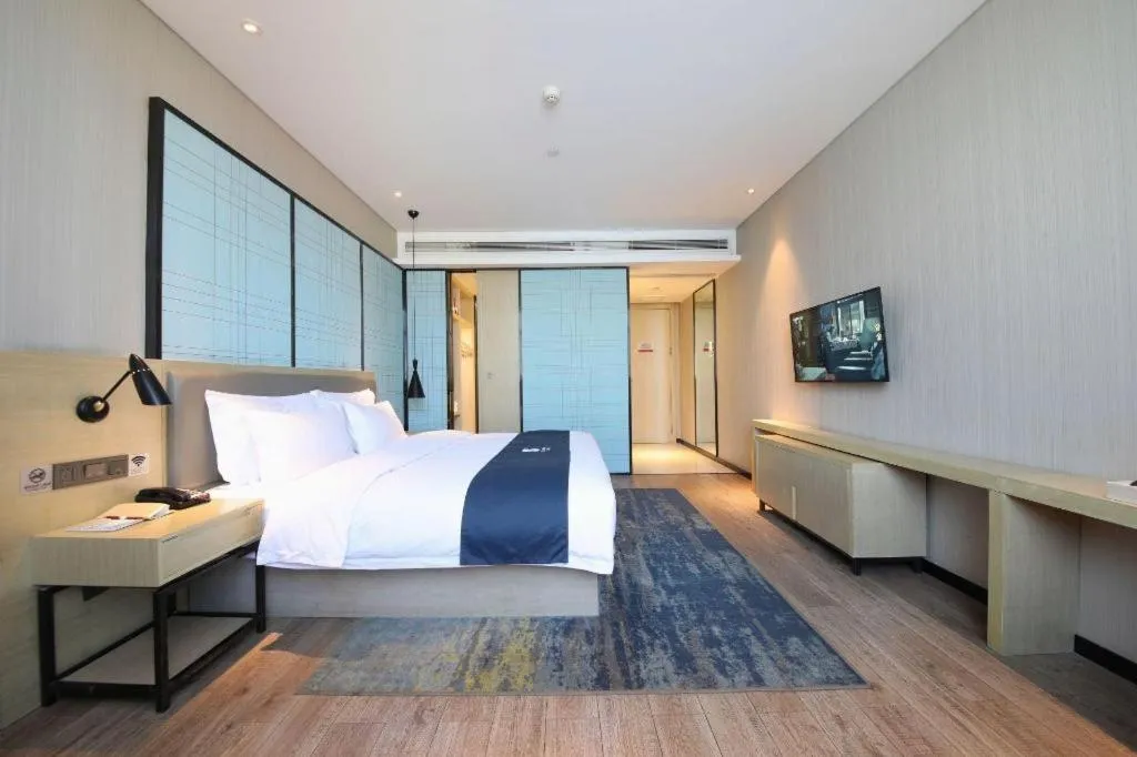 Bed in Echarm Hotel Guiyang North High-speed Railway Station