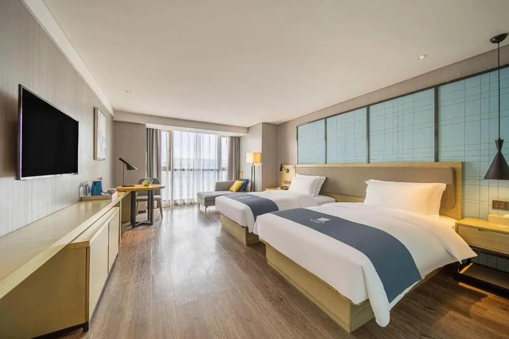 Bed in Echarm Hotel Guiyang North High-speed Railway Station